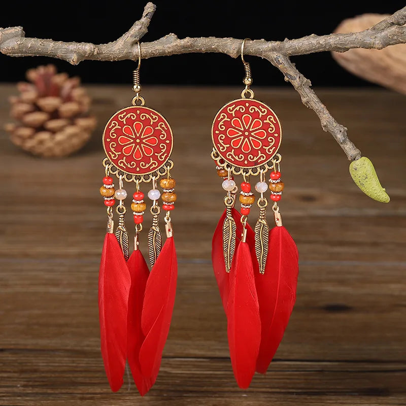 Aros Largos Boho con Pluma y Borlas