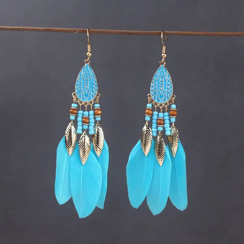 Aros Largos Boho con Pluma y Borlas