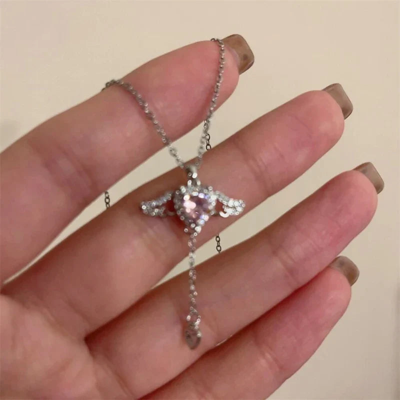 Collar con Dije Planeta y Corazón Rosa con Zirconia