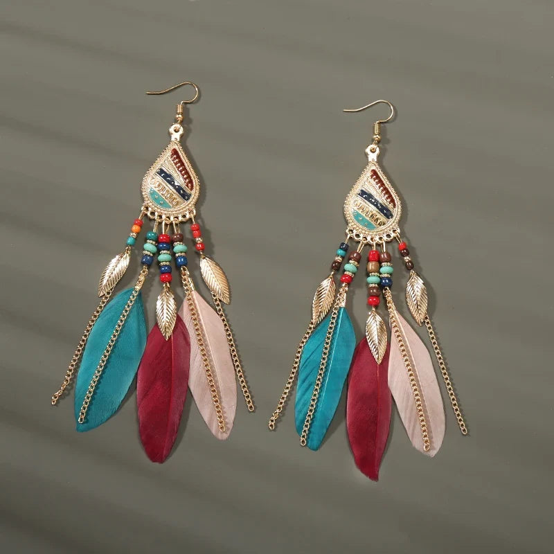 Aros Largos Boho con Pluma y Borlas