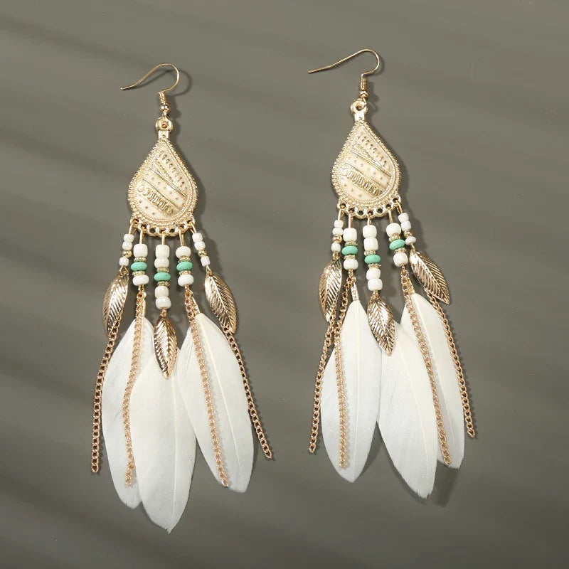 Aros Largos Boho con Pluma y Borlas