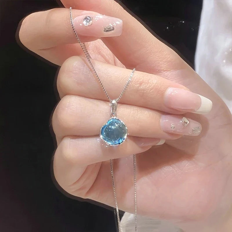 Collar con Dije Planeta y Corazón Rosa con Zirconia