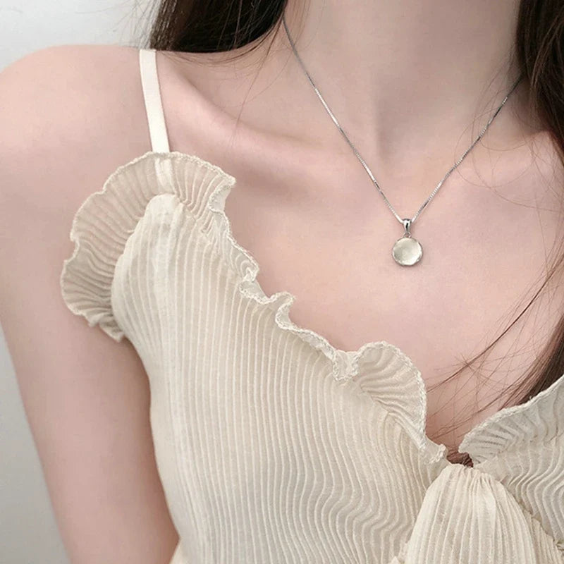 Collar con Dije Planeta y Corazón Rosa con Zirconia