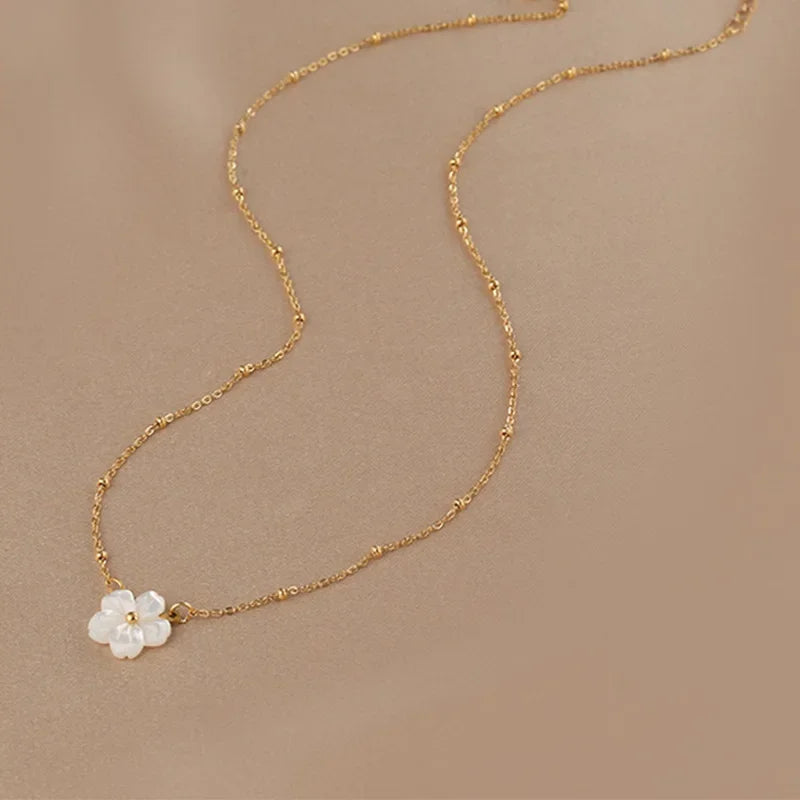 Collar de Acero Inoxidable con Dije Flor de Concha