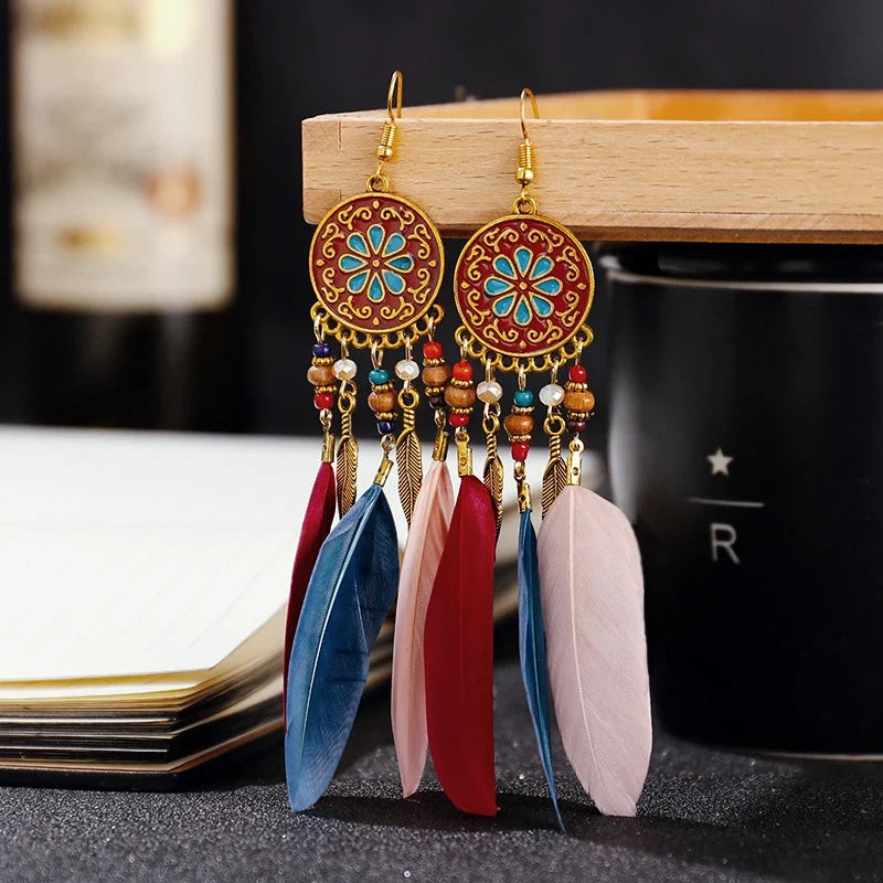 Aros Largos Boho con Pluma y Borlas