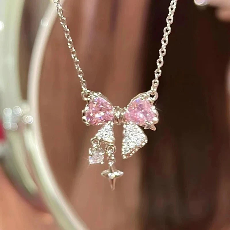 Collar con Dije Planeta y Corazón Rosa con Zirconia