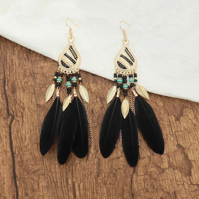 Aros Largos Boho con Pluma y Borlas