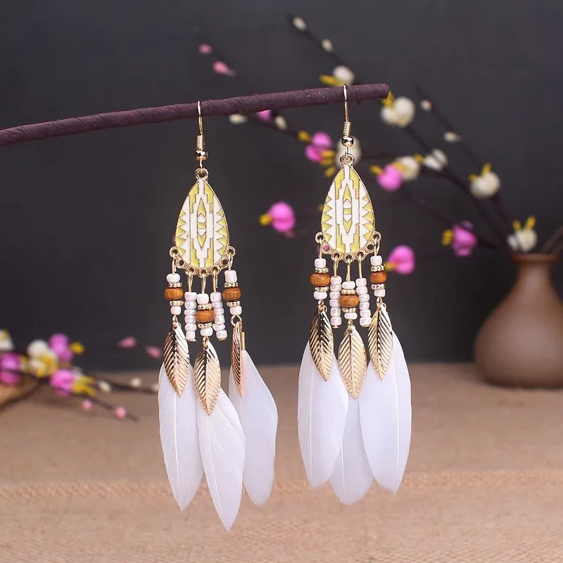 Aros Largos Boho con Pluma y Borlas