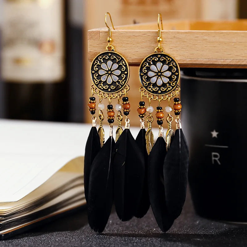 Aros Largos Boho con Pluma y Borlas
