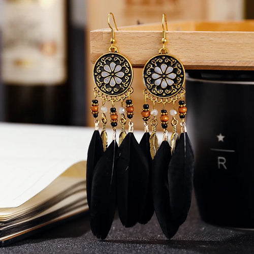 Aros Largos Boho con Pluma y Borlas