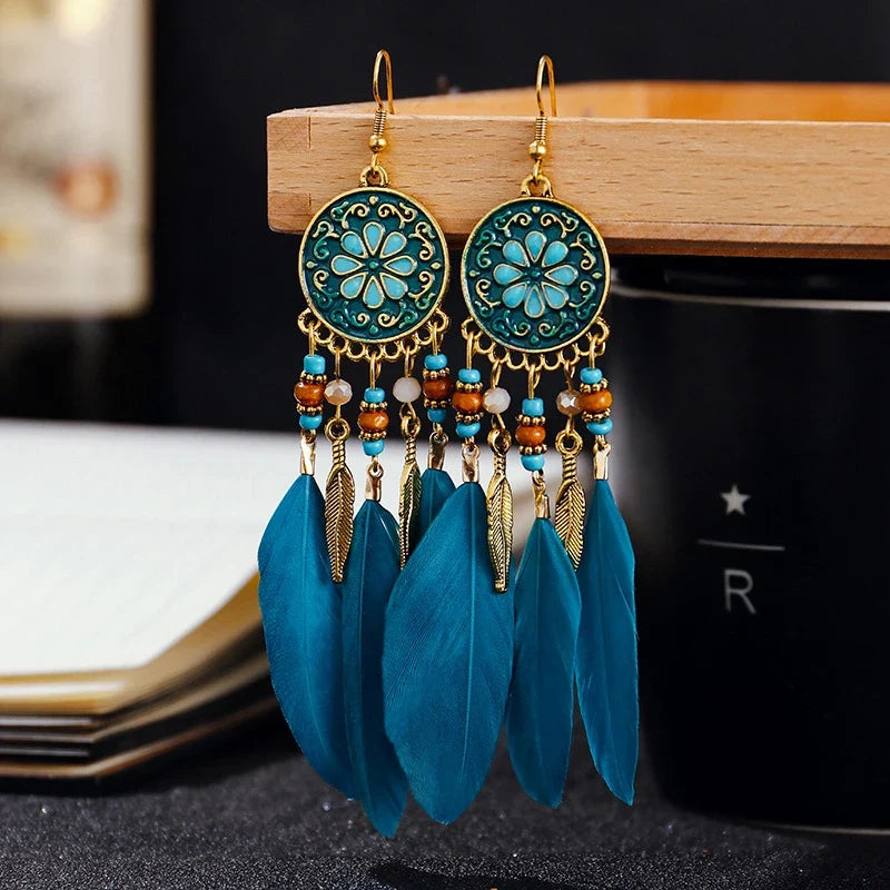 Aros Largos Boho con Pluma y Borlas
