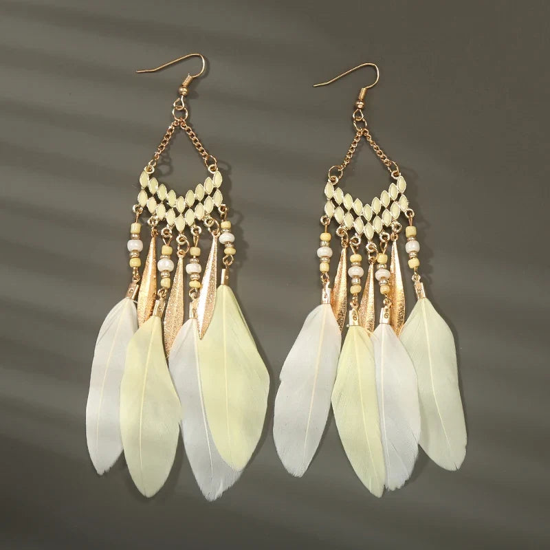 Aros Largos Boho con Pluma y Borlas