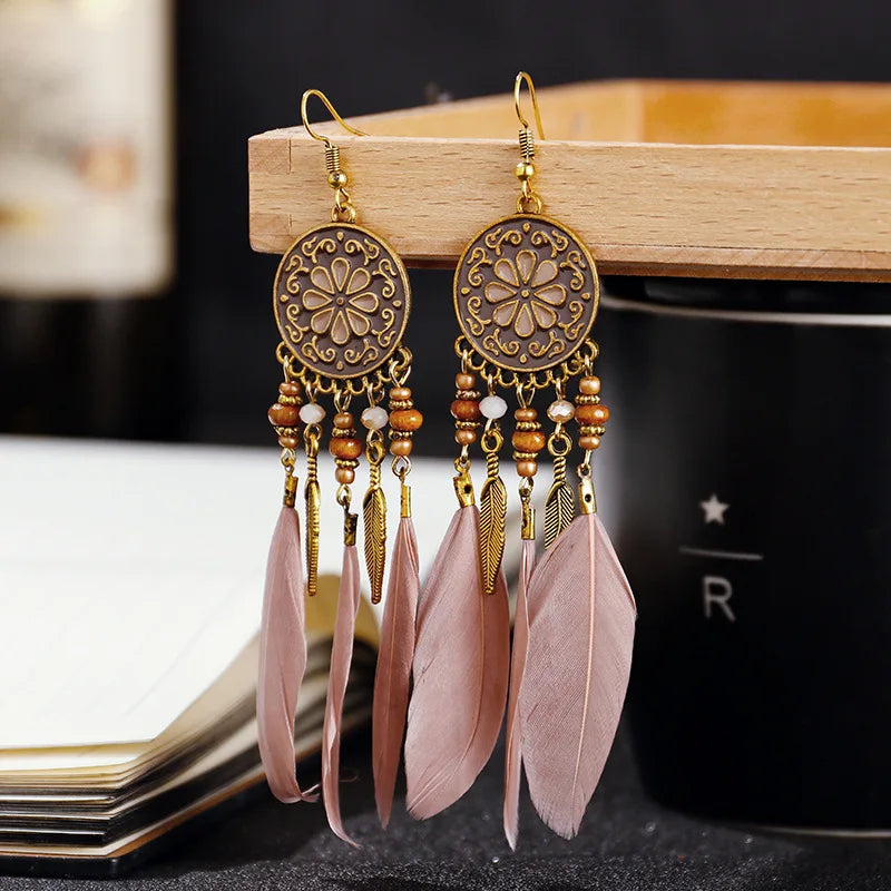 Aros Largos Boho con Pluma y Borlas