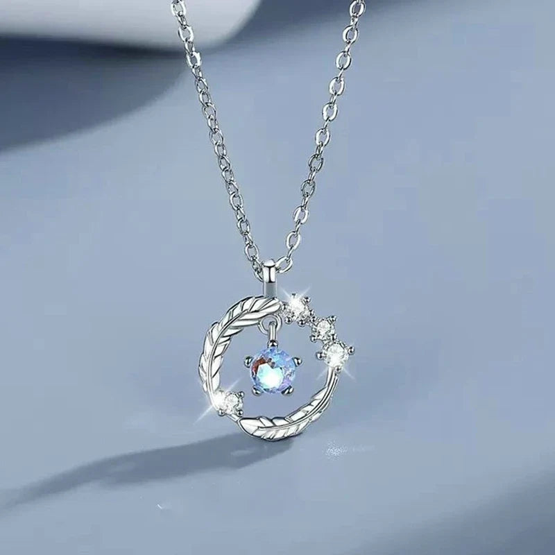 Collar con Dije Planeta y Corazón Rosa con Zirconia