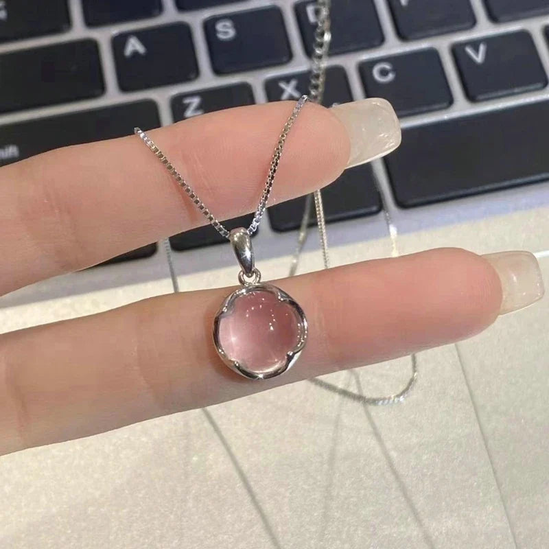 Collar con Dije Planeta y Corazón Rosa con Zirconia