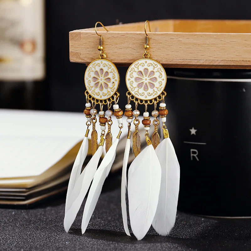 Aros Largos Boho con Pluma y Borlas