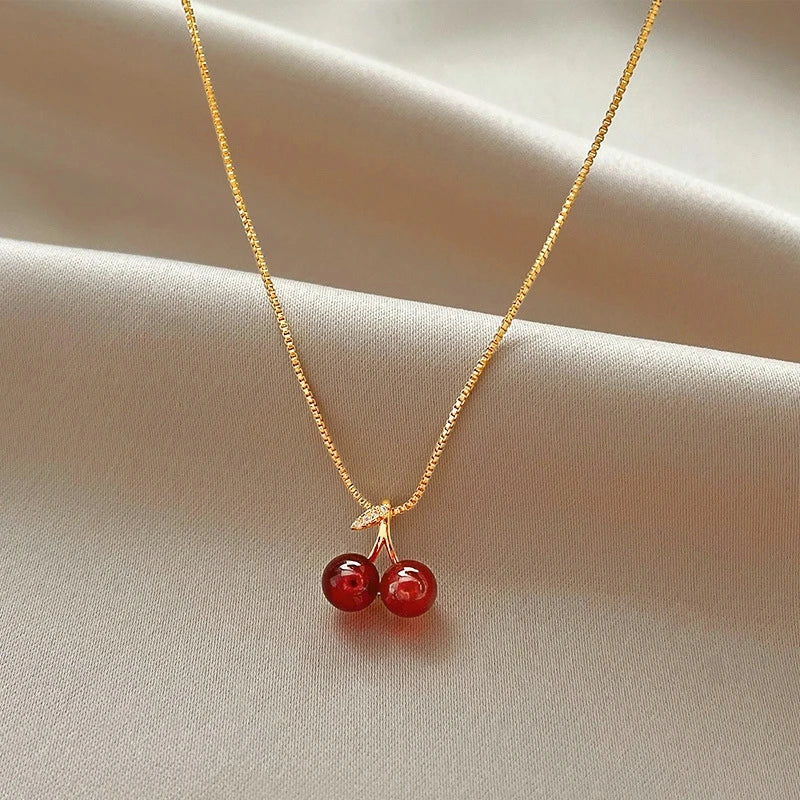 Collar con Dije Planeta y Corazón Rosa con Zirconia