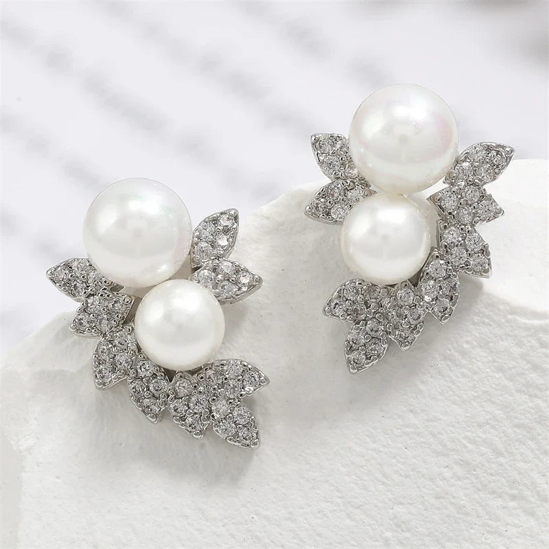 Aros Stud con Perla y Zirconia Forma de Hoja